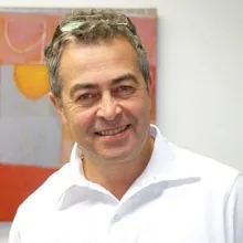 Dr. Karl Schneider